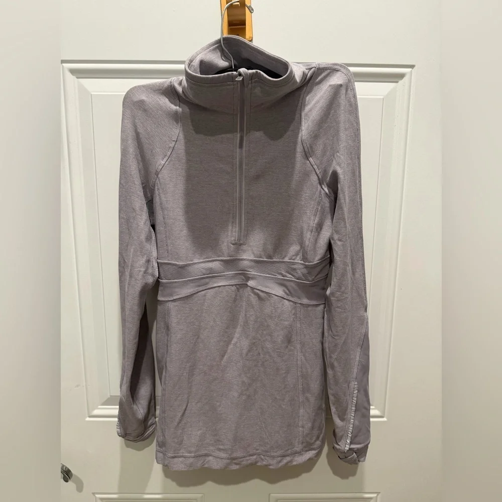 Lululemon Full Tilt Half Zip Pullover in a light lilac/lavender